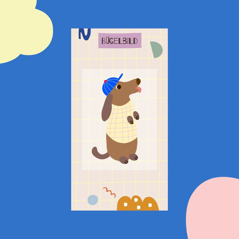 Bügelbild Dackel mit Schirmmütze auf Karte