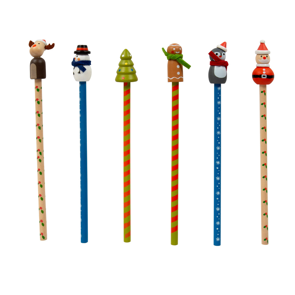 Sechs Bleistifte mit Rentier, Schneemann, Tannenbaum, Lebkuchenmann, Pinguin und Weihnachtsmann nebeneinander