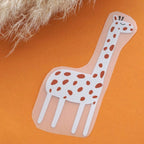 Ausgeschnittenes Giraffen-Bügelbild auf Orange