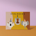 Einladungskarte mit Koala, Leopard und Elefant mit Partyhüten