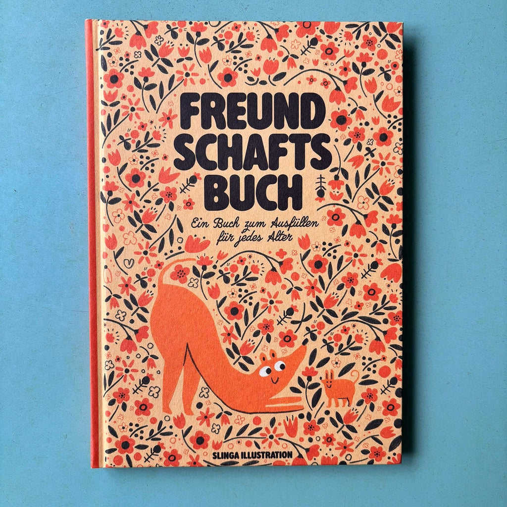 Freundschaftsbuch mit rotem Blumenmuster und orangem Fuchs auf dem Hardcover