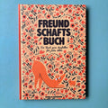 Freundschaftsbuch mit rotem Blumenmuster und orangem Fuchs auf dem Hardcover