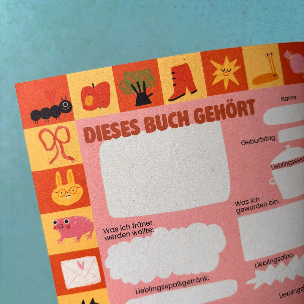 Seite Dieses Buch gehört mit bunter Bordüre