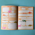 Doppelseite mit Dinos und Schreibzeilen