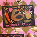 Dunkles Frühstücksbrettchen mit Ente und Schriftzug Unentlich köstlich