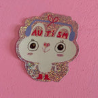 Glitzersticker Hase mit Kopfhörern und Schriftzug Autism