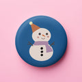 Runder Magnet mit Schneemann auf Blau