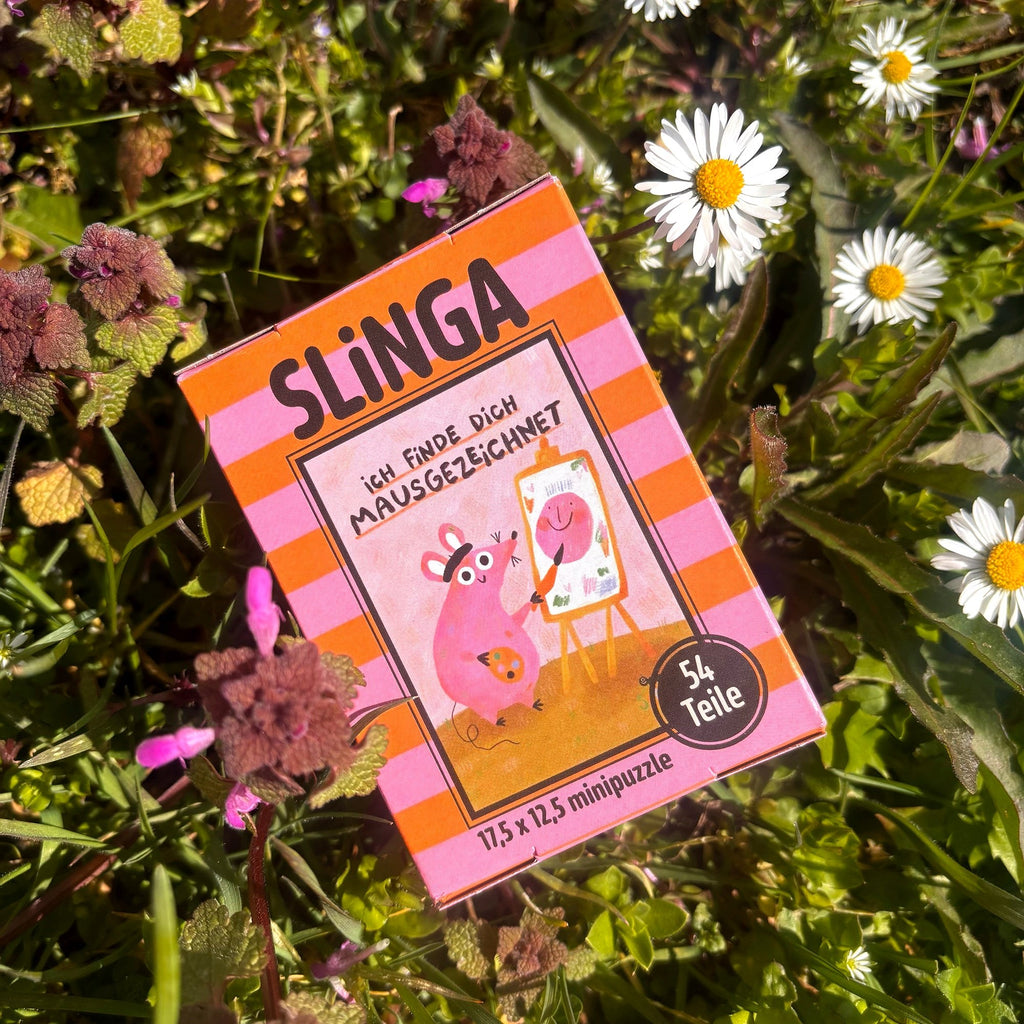 Rosa Puzzleschachtel mit Maus an der Staffelei