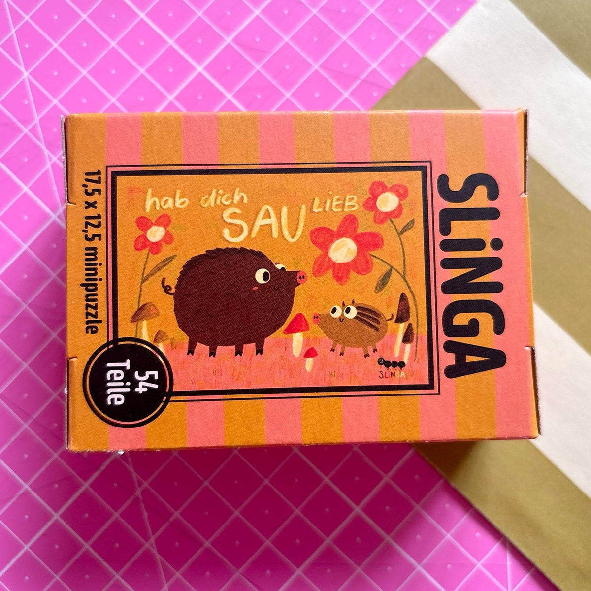 Orange Puzzleschachtel mit Wildschweinen und Schriftzug Hab dich sau lieb